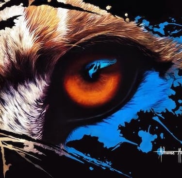 a lioness eye looking at prey reflected in eye