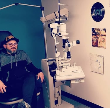 Patient in eye exam room at Edge Optics Fort Collins