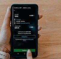 person holding black samsung android smartphone