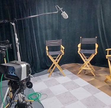 Simple black curtain with 3 Director's Chairs