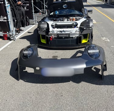 an Enlab Porsche car with a hood on it