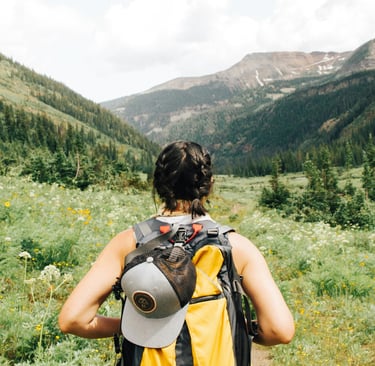 woman hiking by Holly Mandarich