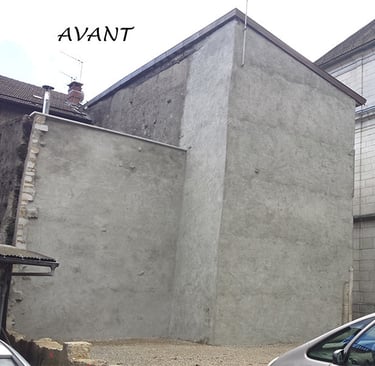 Façades vides avant la réalisation de fresques en trompe-l'oeil situées à Moirans-en-Montagne