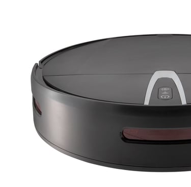 a robot vacuum cleaner with a black and white background