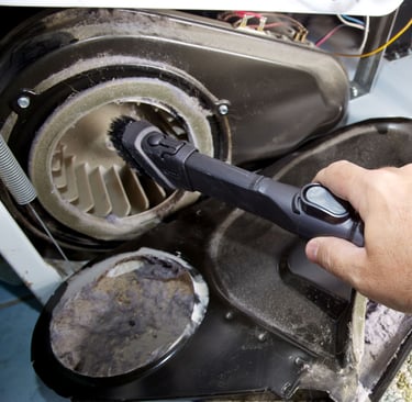 a person holding a brush and a brush in their hand