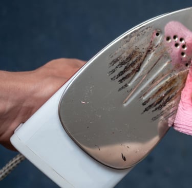 a person holding a cloth and a cloth