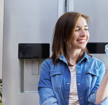 a woman holding a bowl of ice cream