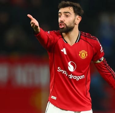 a man in a red jersey is pointing at something