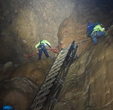 Fixed ladder at the base of the great wall of vietnam, hang son doong cave, vietnam