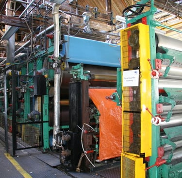 a machine that is making a paper towel