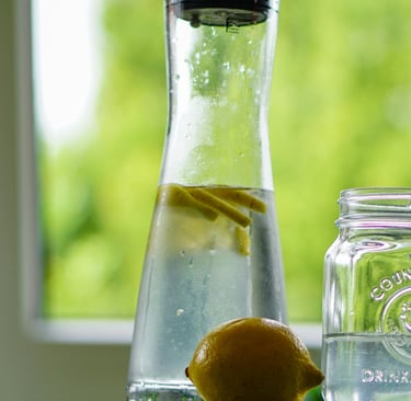 Refreshing detox water with lemon, cucumber, and mint in a glass jar, perfect boosting metabolism