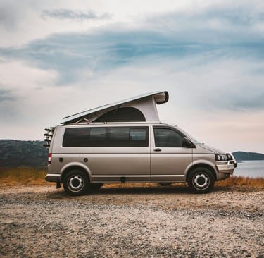 Modern campervan near lake