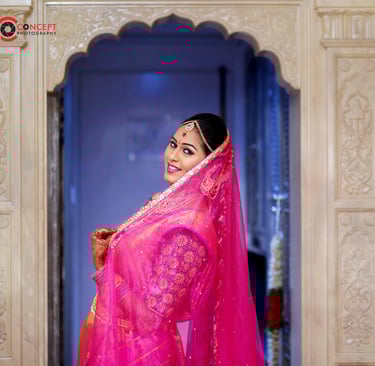 a woman in a pink sari, wedding photography