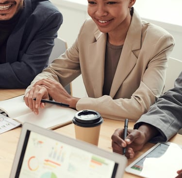 a group of people sitting around a table