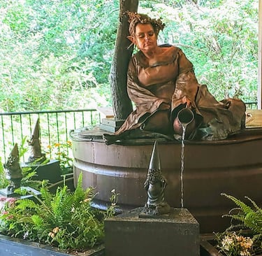 Lookout Mtn, GA - A statue in bronze was actually a live person at Rock City Gardens