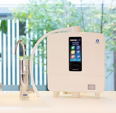 Enagic Leveluk K8 Kangen Water ionizer placed on a white counter featuring a large full LCD panel