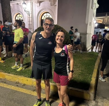 Corredores posando en el puerto de Valencia