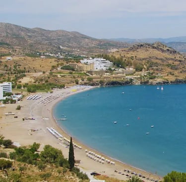a beach with a view of a beach and a boat