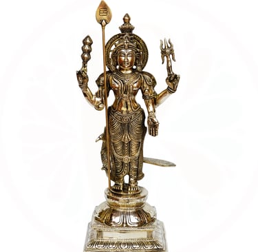 a statue of a vishnu holding a sword