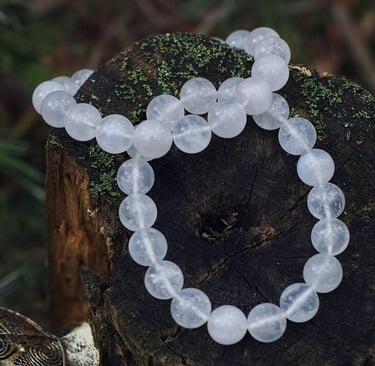 two bracelets on a stone