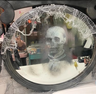 a mirror with a creepy ghost