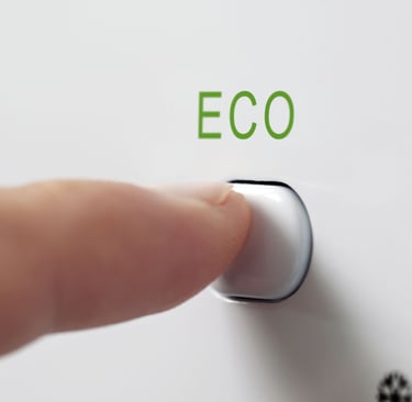 a finger pressing the word eco on a button