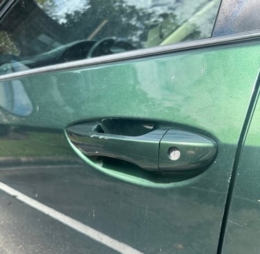 2016 Green Toyota Corolla door lock repaired by local and affordable locksmith