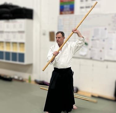 Mark practicing bojutsu