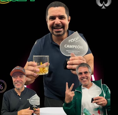 a man holding a trophy and a glass of alcohol