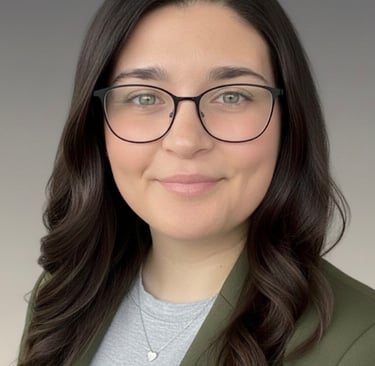 a woman in glasses and a green jacket