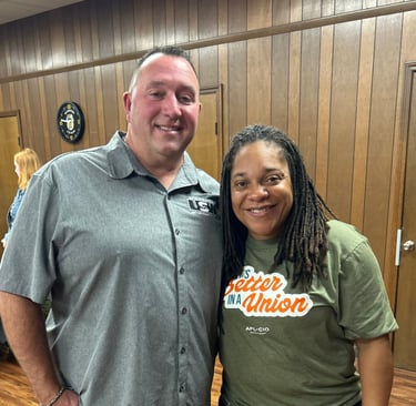 a man and woman standing in a room