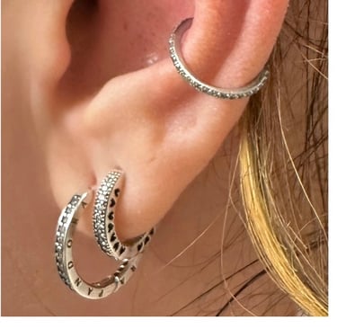 Stylish lobe piercing jewellery fitted with titanium studs
