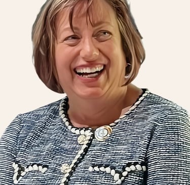 image of a smiling woman's head and shoulders dressed in a blue and white suit