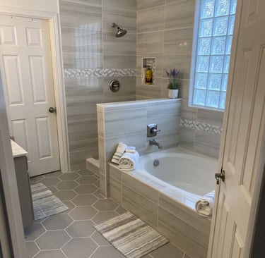 Sparkling clean bathroom with bathtub, towels, and tile finish – SparkEaseCleaning premium bathroom 