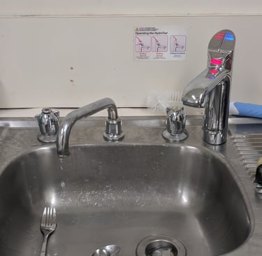 old leaking kitchen sink taps