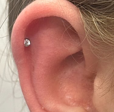 Healing helix piercing with hypoallergenic titanium stud in Montrose