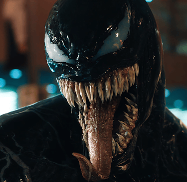 a man in a black suit and a mask with a mouth open