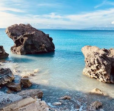 a rocky beach near a body of water