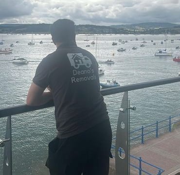 deano removals tshirt being worn by worker