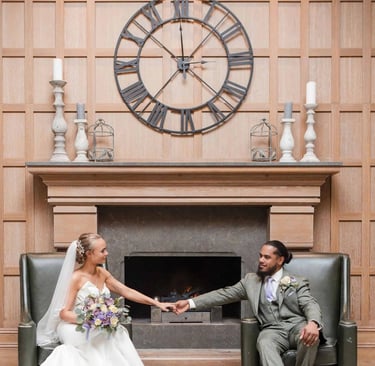 Newly weds hold hands in a beautiful wedding portrait