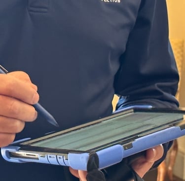 “Inspector writing notes — digital photo reports for seasonal homes