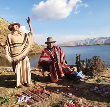 a woman in a traditional dress and a man in a hat opening sacred space