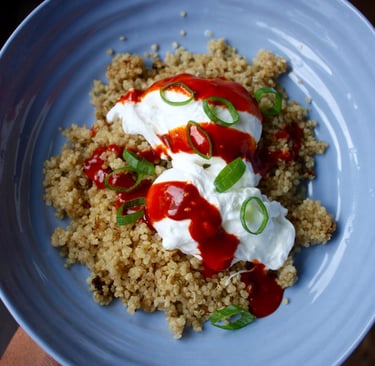 quick and easy powerhouse breakfast - quinoa topped with poached egg and Korean sauce