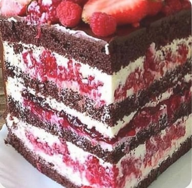 a piece of cake with strawberries on top of it
