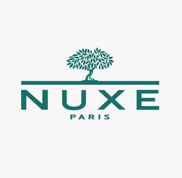 Logo of NUXE, a global beauty brand whose standards are met by King Fly.