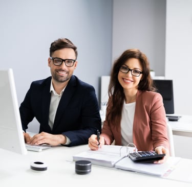 image of man and woman at accountant office smiling