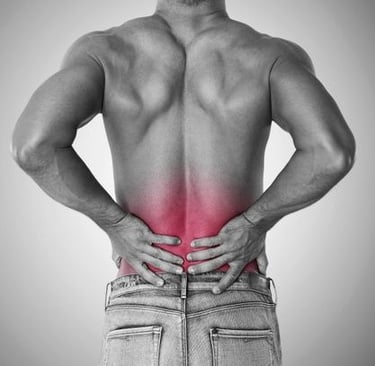 a man with a back pain in a back pain