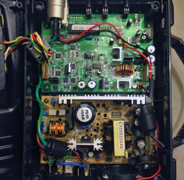 the internal motherboard of an IDX jl-2 plus charger