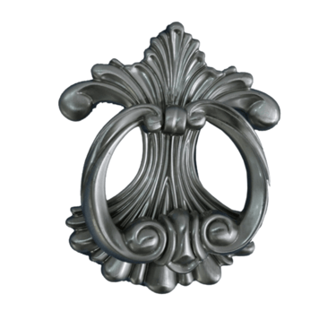 a metal door handle with a decorative design