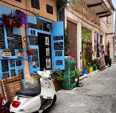 a scooter parked in front of a restaurant